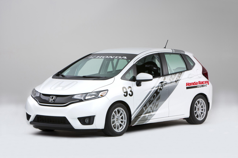 Illustration for article titled A Honda Fit With A Grom In The Back Is Something We Need Yesterday